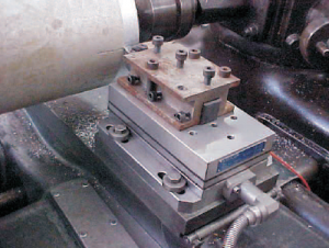 the cutting tool on the lathe exerts a force